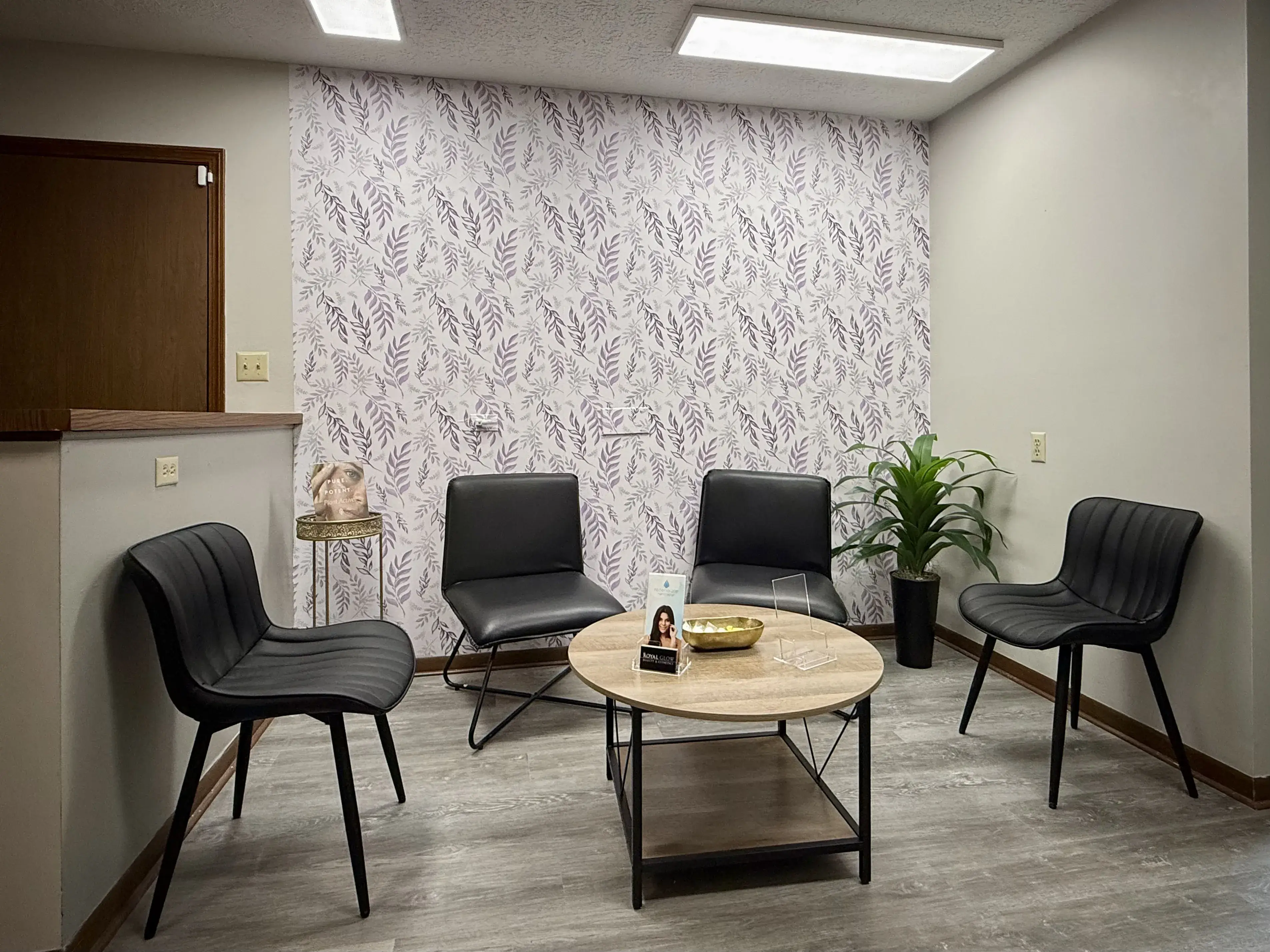 Comfortable reception seating area at Royal Glow Beauty and Esthetics in Boardman Ohio