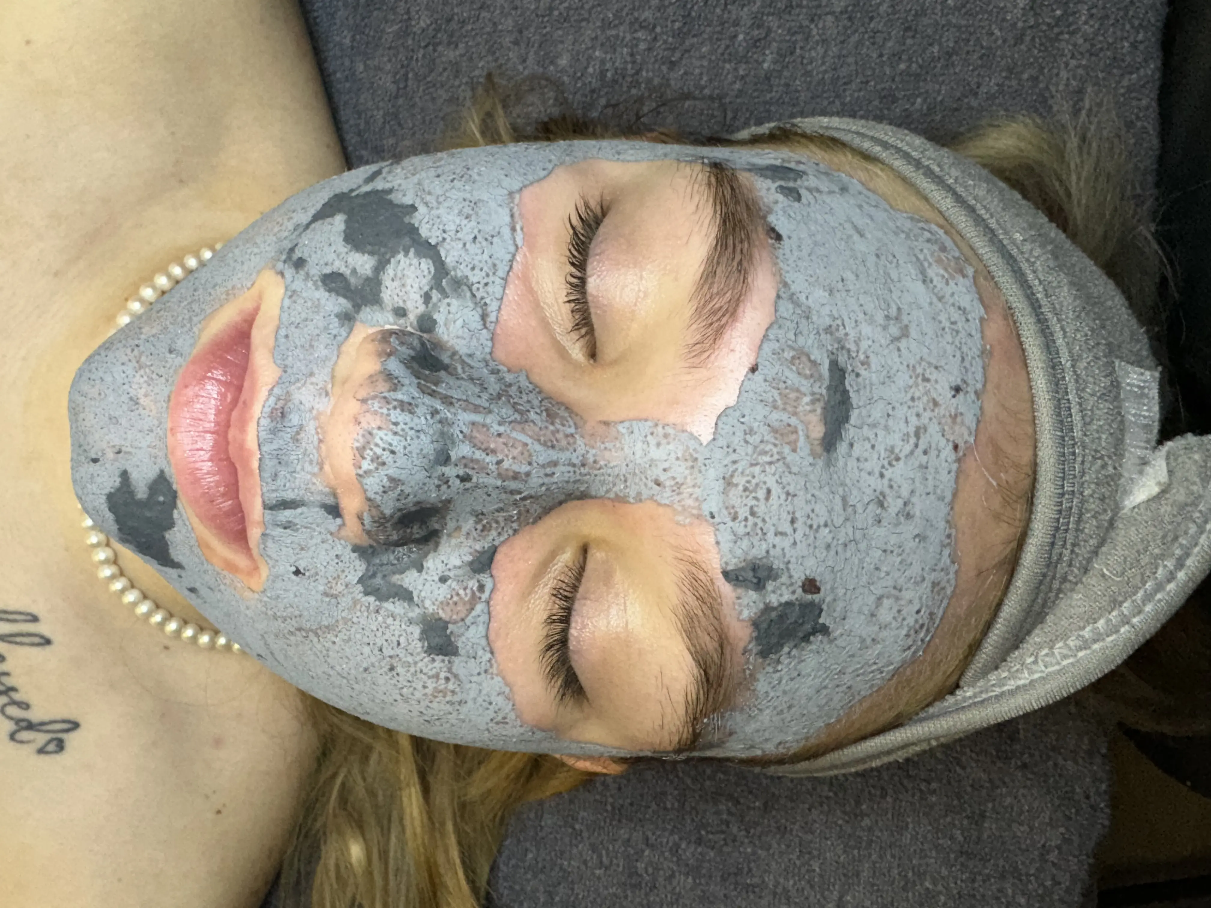 Professional facial mask treatment showing relaxing spa experience at Royal Glow Beauty and Esthetics in Boardman Ohio